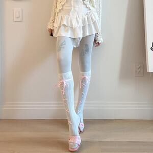 Sheer knit bow detail knee